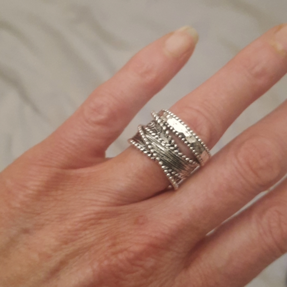 NWT in packaging size 8 ring ! Silver stack band ring looks hot on thumbs even!